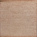 Textured rug with a herringbone pattern in white and orange.