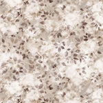 Detail of fabric in a painterly leaf print in shades of tan and purple with a mottled white overlay.