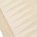 Handwoven rug in a geometric design in shades of beige. 