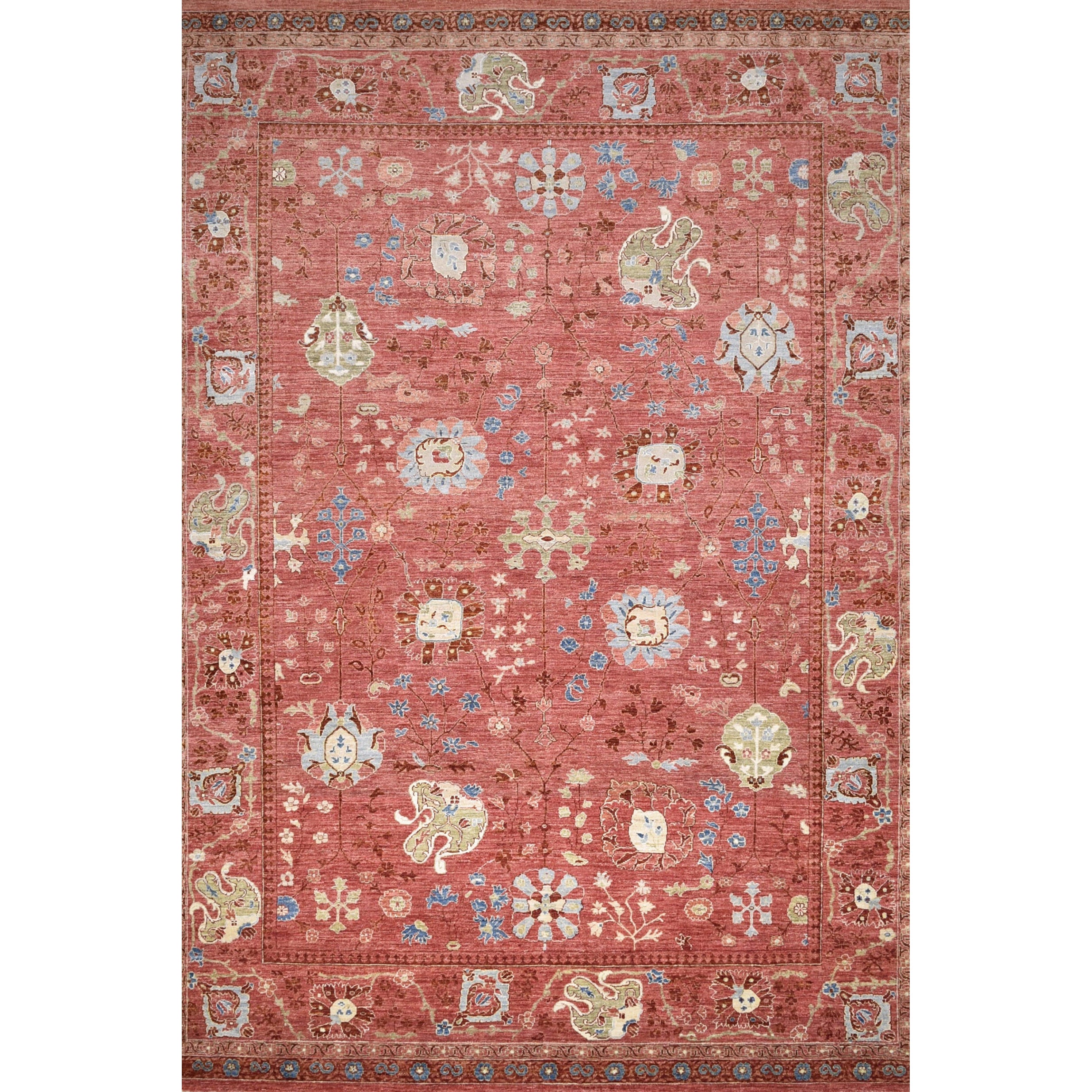 Decorative rug with intricate patterns on a red background