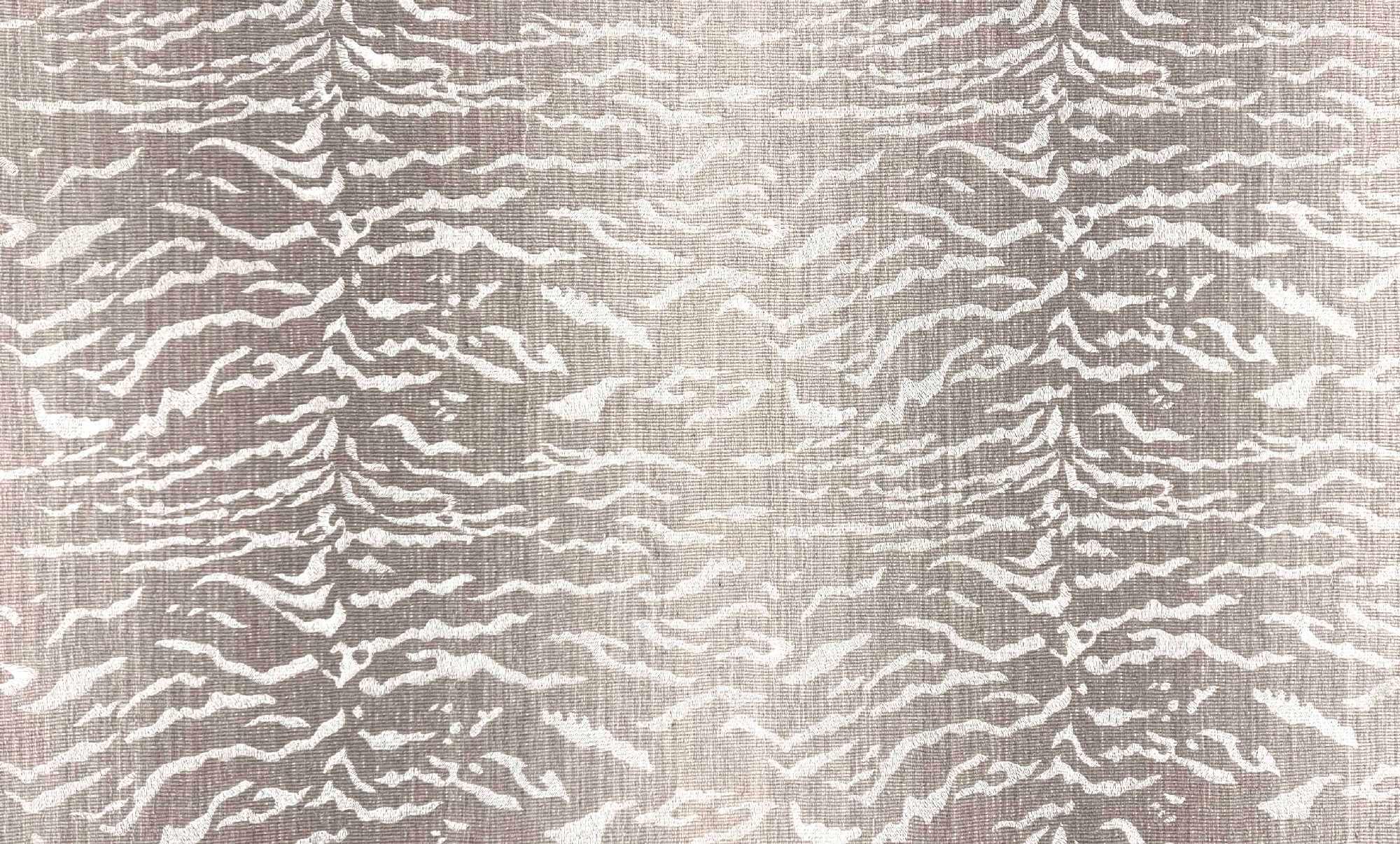 Broadloom carpet in a tiger inspired pattern in shades of taupe.