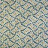 Detail of fabric in painterly diamond print in blue and green on a white field.