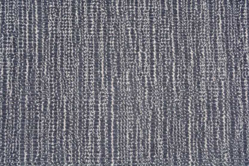 Broadloom carpet swatch in a textural pattern in a blue design