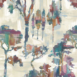 Detail of fabric in a painterly tree print in shades of purple, green and red on a cream field.