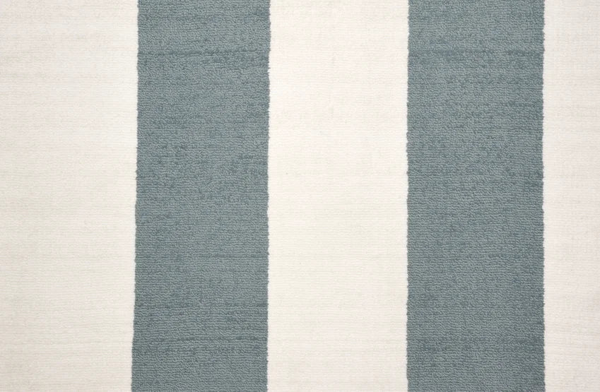 Broadloom carpet swatch in a stripe pattern in a blue design