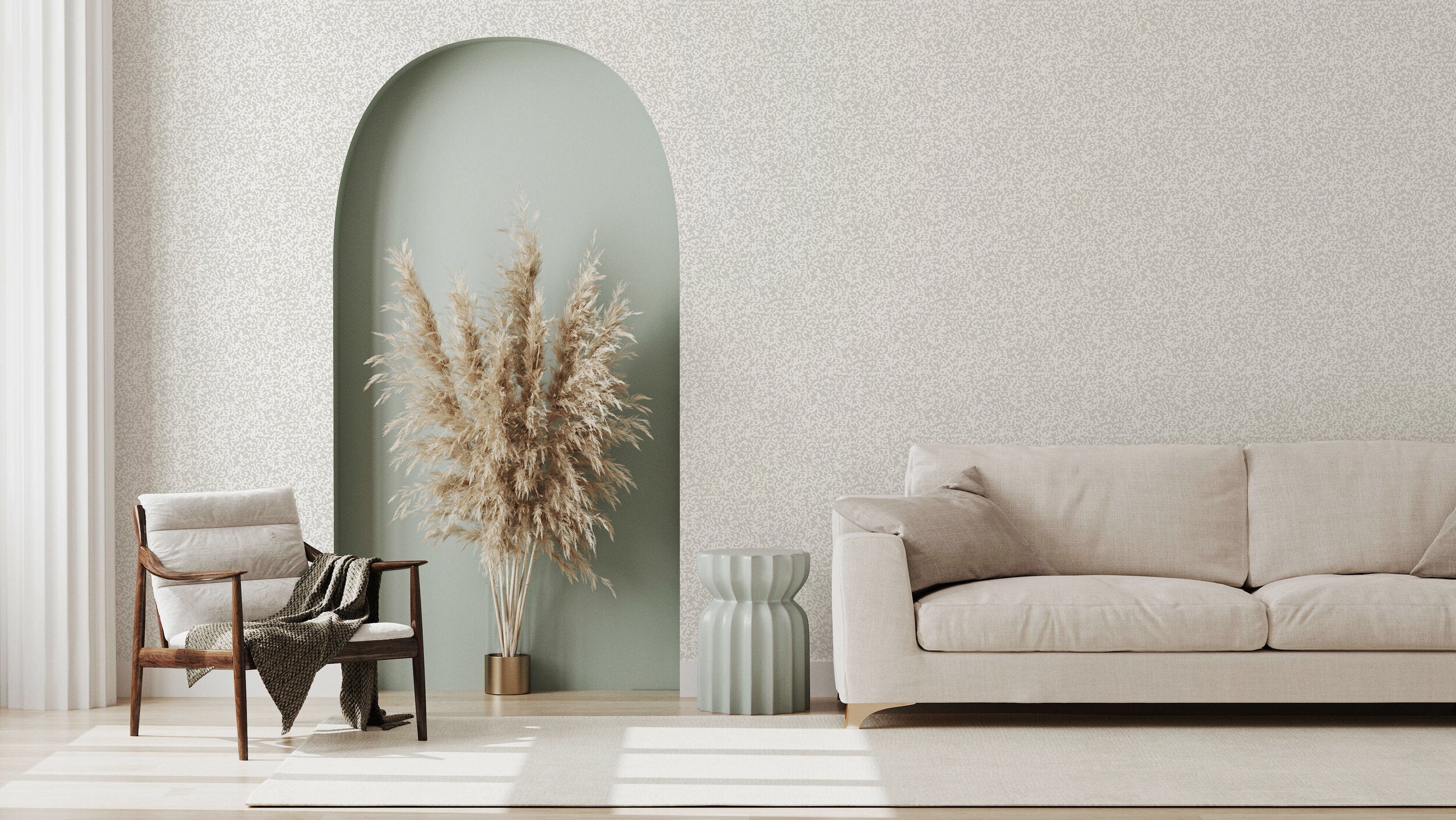 A modernist living room with a wall papered in a painterly abstract print in white on a light gray field.