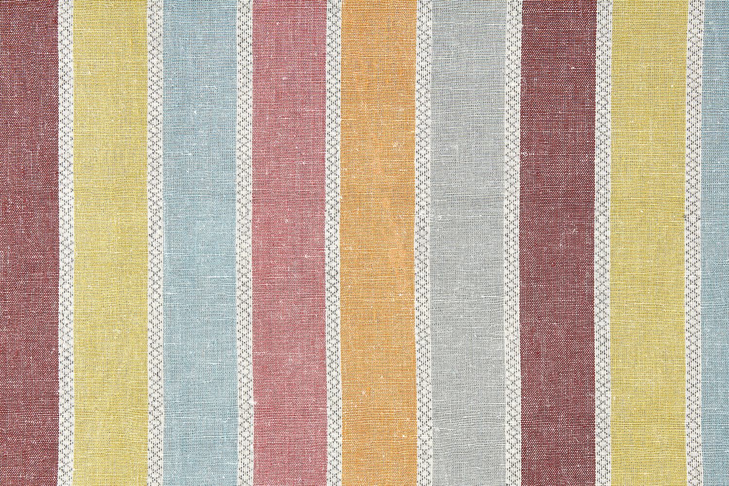 Detail of fabric in a global stripe print in shades of orange, yellow, pink and blue.