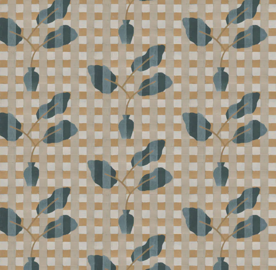 Detail of a plaid pattern in cream and tan, with a blue striped botanical motif. 