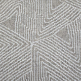 Broadloom carpet sample in a geometric linear pattern in cream on a tan field. 