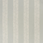 printed linen fabric in a scrolling floral stripe pattern in cream on a light blue-gray field.