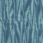 Detail of fabric in a marbled paint print in shades of blue and turquoise.