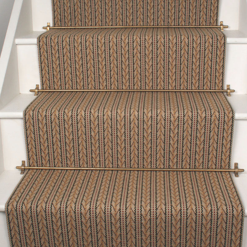 Striped Herrigbone flatweave runner in tan and brown on white staircase