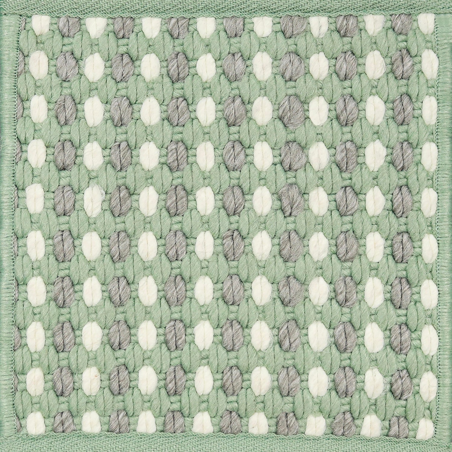 Textured woven outdoor carpet a dashed stripe in white, grey and green.