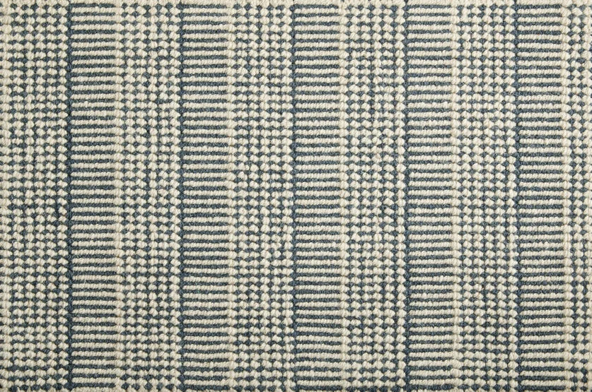 Broadloom carpet swatch in a stripe pattern in a blue design