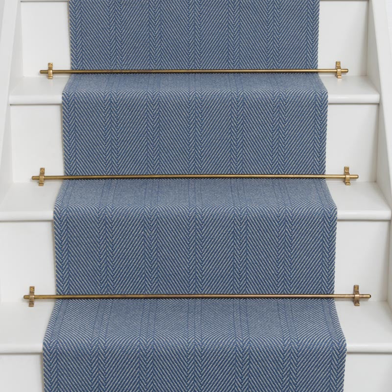 Striped Herringbone flatweave runner in blue on white staircase