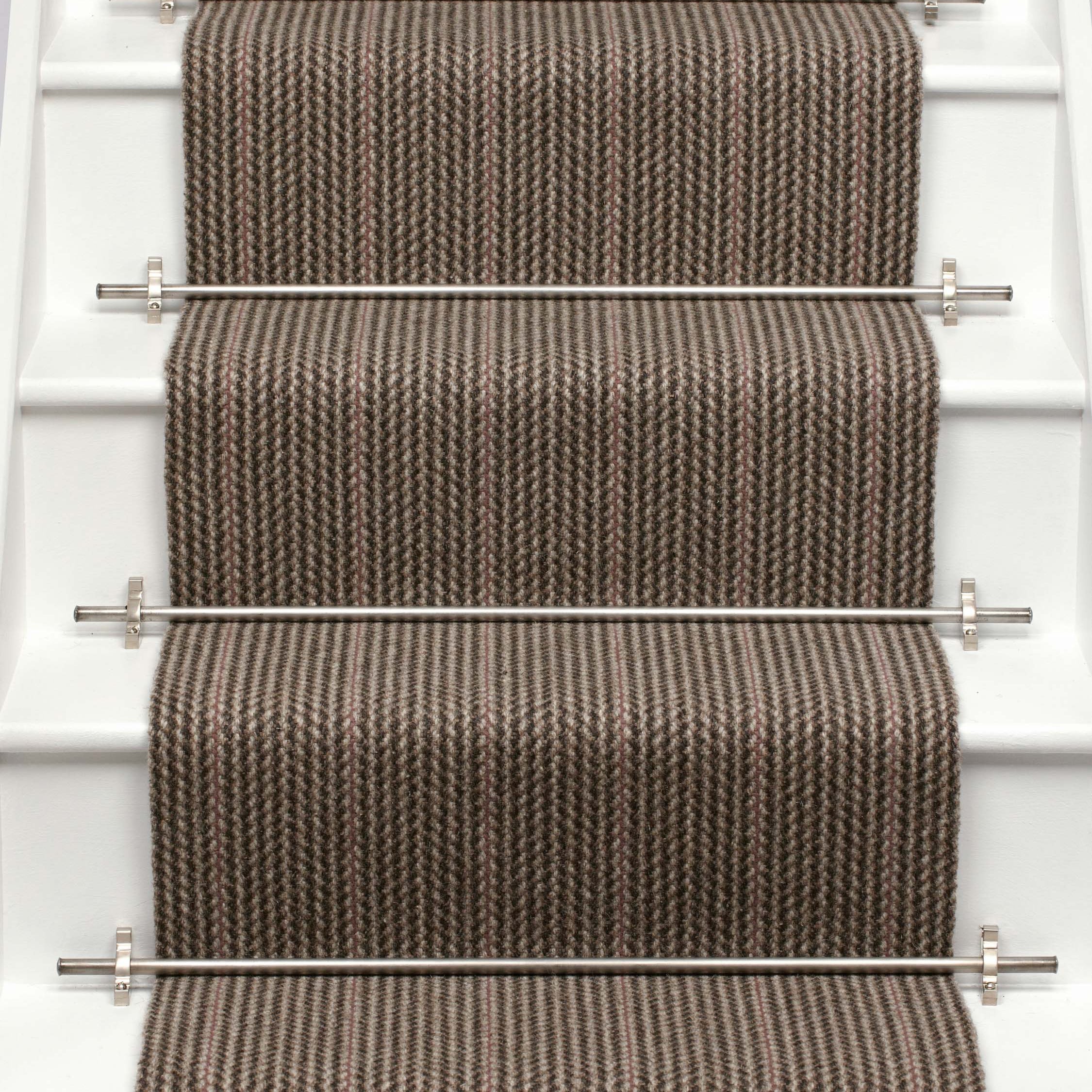 Striped flatweave runner in brown and red on white staircase