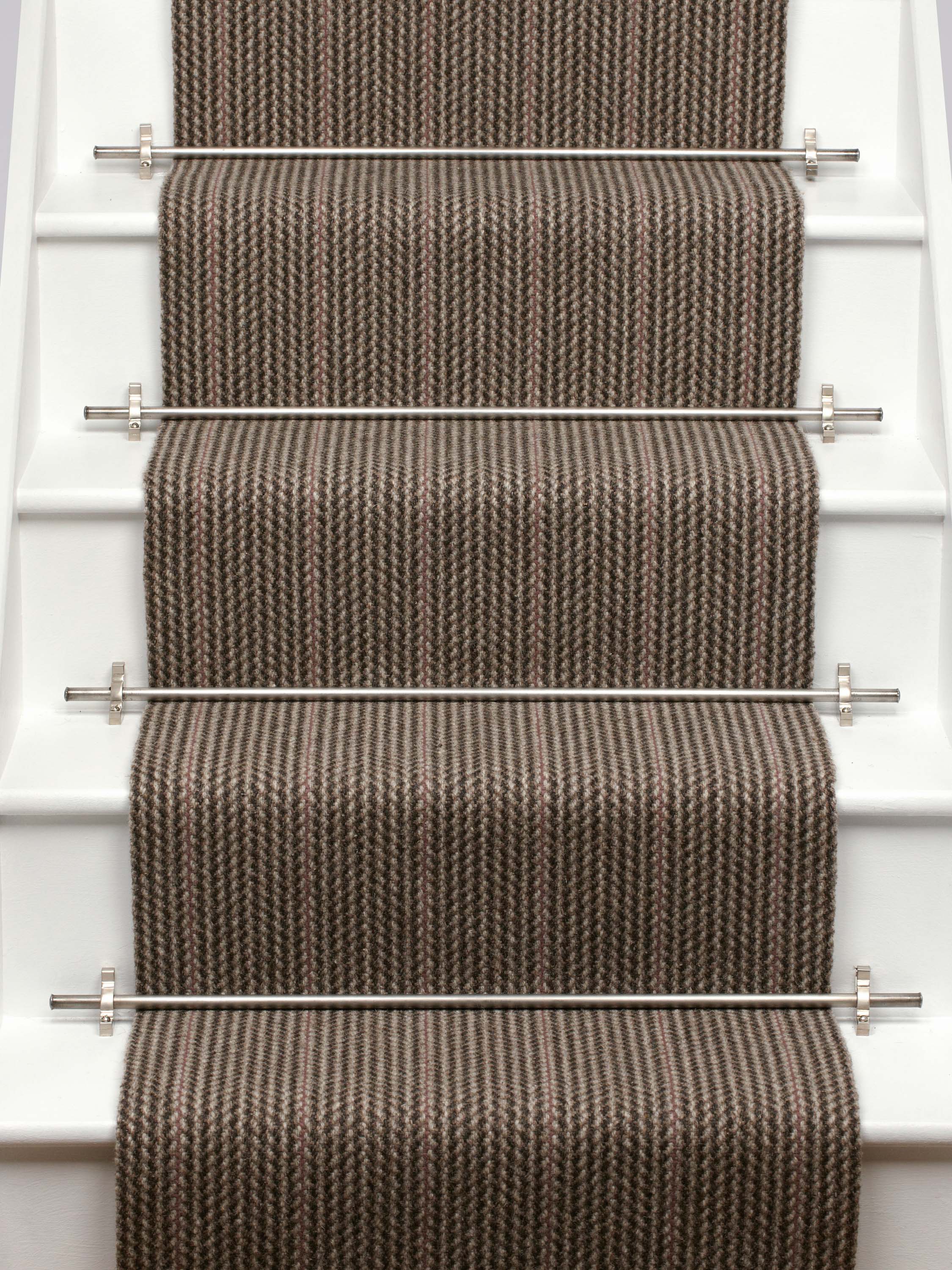 Striped flatweave runner in brown and red on white staircase