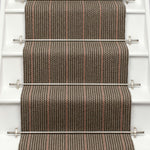 Striped flatweave runner in grey and red on white staircase