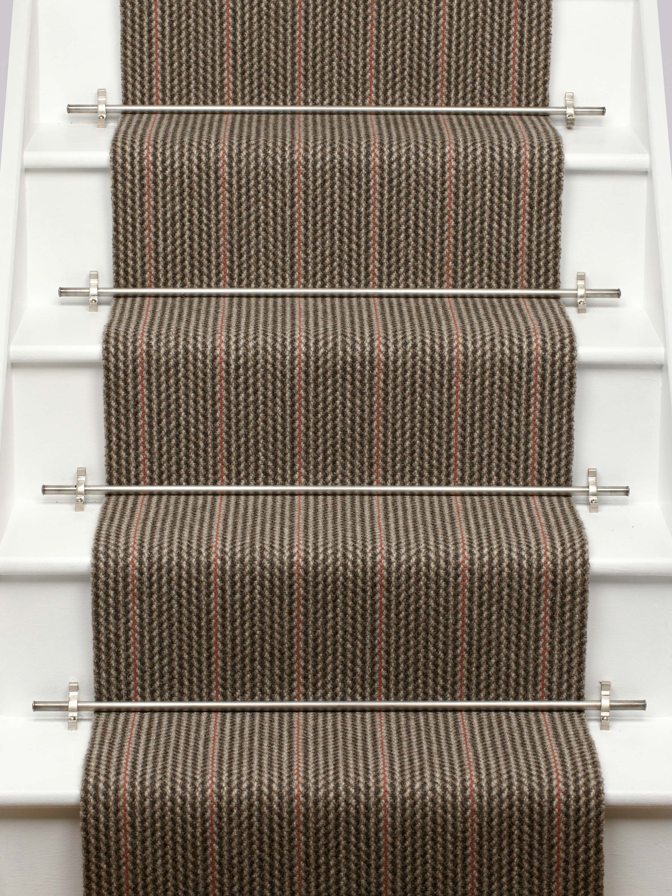 Striped flatweave runner in grey and red on white staircase