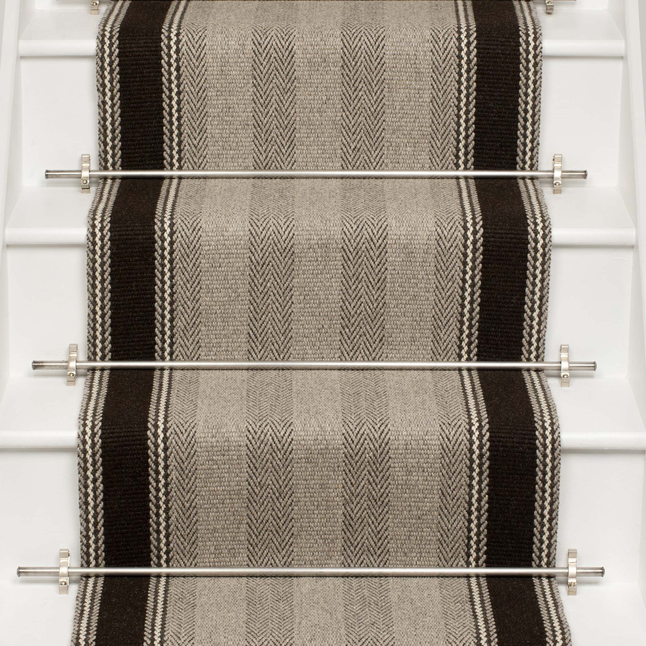 Striped flatweave runner in grey and black on white staircase