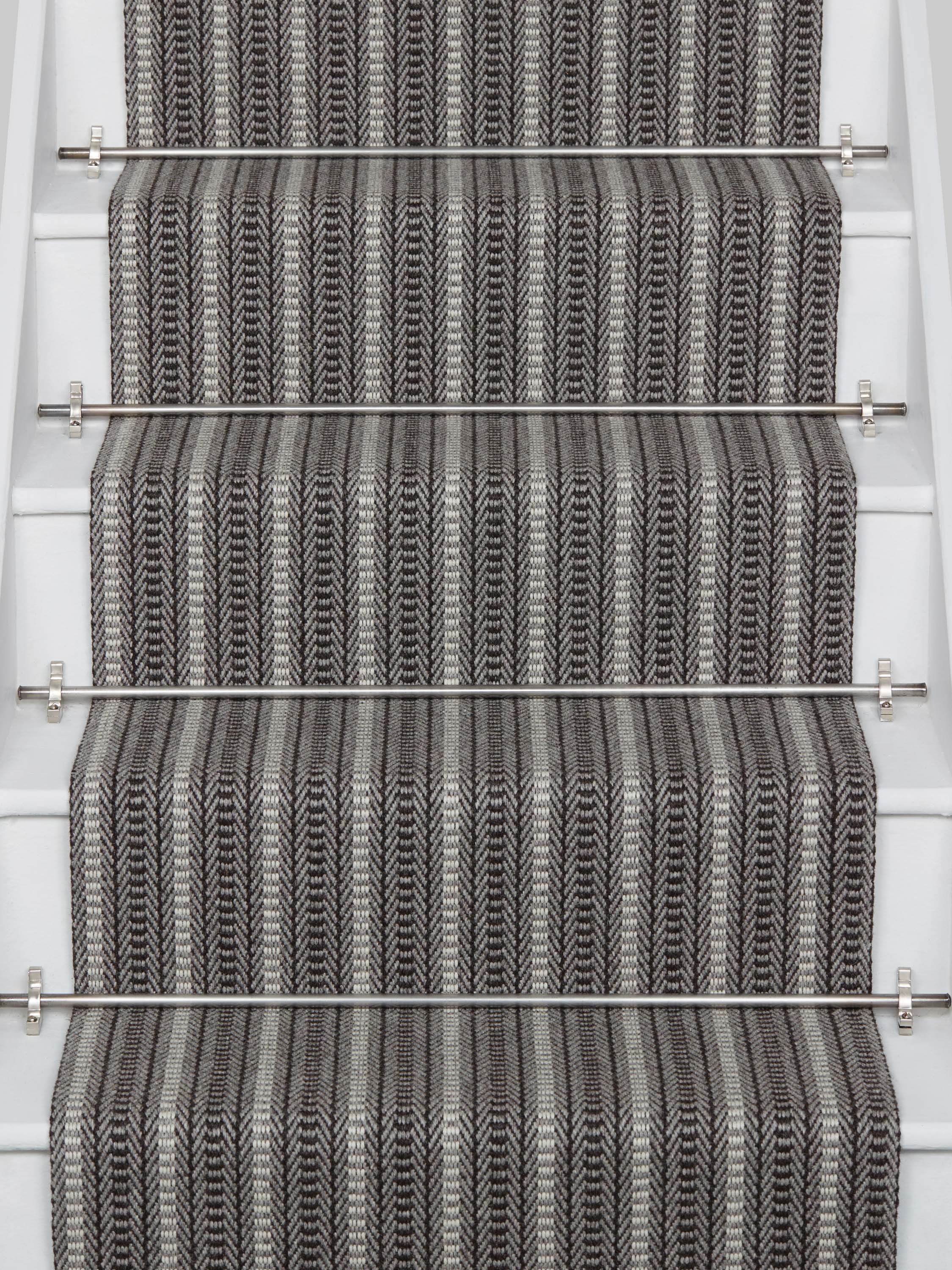 Striped flatweave runner in grey and black on white staircase