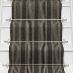 Striped flatweave runner in dark grey and black on white staircase