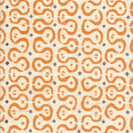 Detail of fabric in a curvilinear stripe pattern in orange and purple on a cream field.