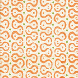 Detail of fabric in a curvilinear stripe pattern in orange and green on a cream field.