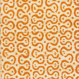 Detail of fabric in a curvilinear stripe pattern in orange on a cream field.