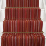 Striped flatweave runner in red on white staircase