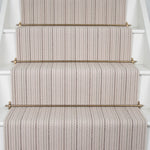 Striped flatweave runner in cream and grey on white staircase