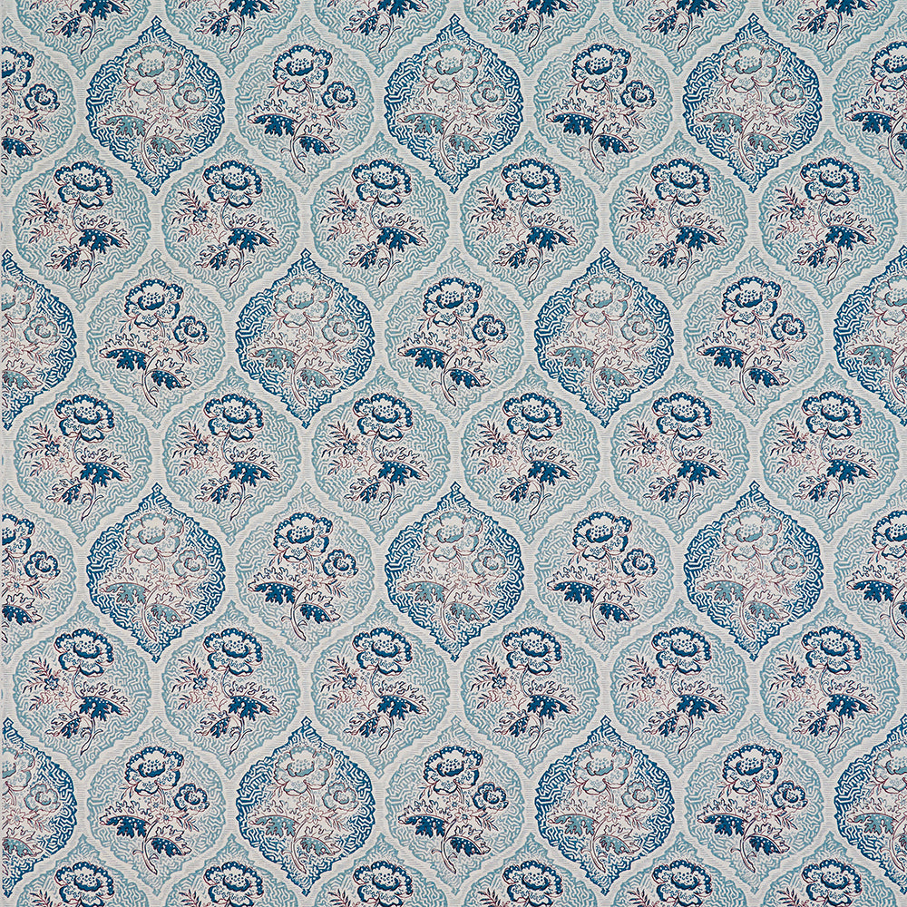 Detail of fabric in a floral damask print in shades of brown, blue and navy on a cream field.