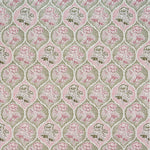 Detail of fabric in a floral damask print in shades of pink and green on a cream field.