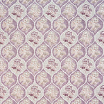 Detail of fabric in a floral damask print in shades of purple, cream and tan on a cream field.