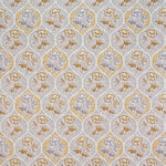 Detail of fabric in a floral damask print in shades of gray and mustard on a cream field.