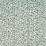 Detail of fabric in a floral damask print in shades of gray, blue and green on a cream field.