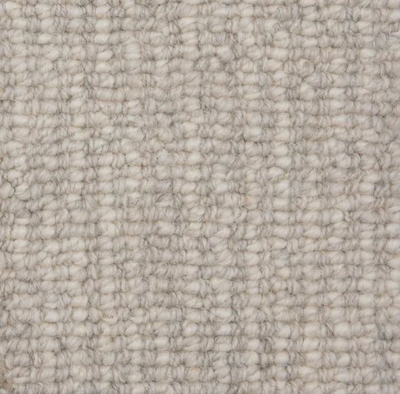 Broadloom carpet swatch in a textured pattern in a light grey design