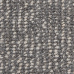 Broadloom carpet swatch in a textured pattern in a dark slate grey design