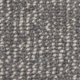 Broadloom carpet swatch in a textured pattern in a dark slate grey design