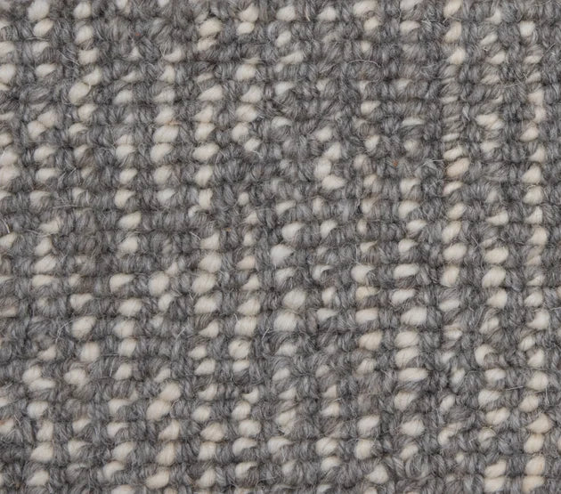 Broadloom carpet swatch in a textured pattern in a dark slate grey design