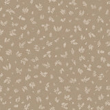 Detail of wallpaper in a minimal repeating leaf print in cream on a light brown field.