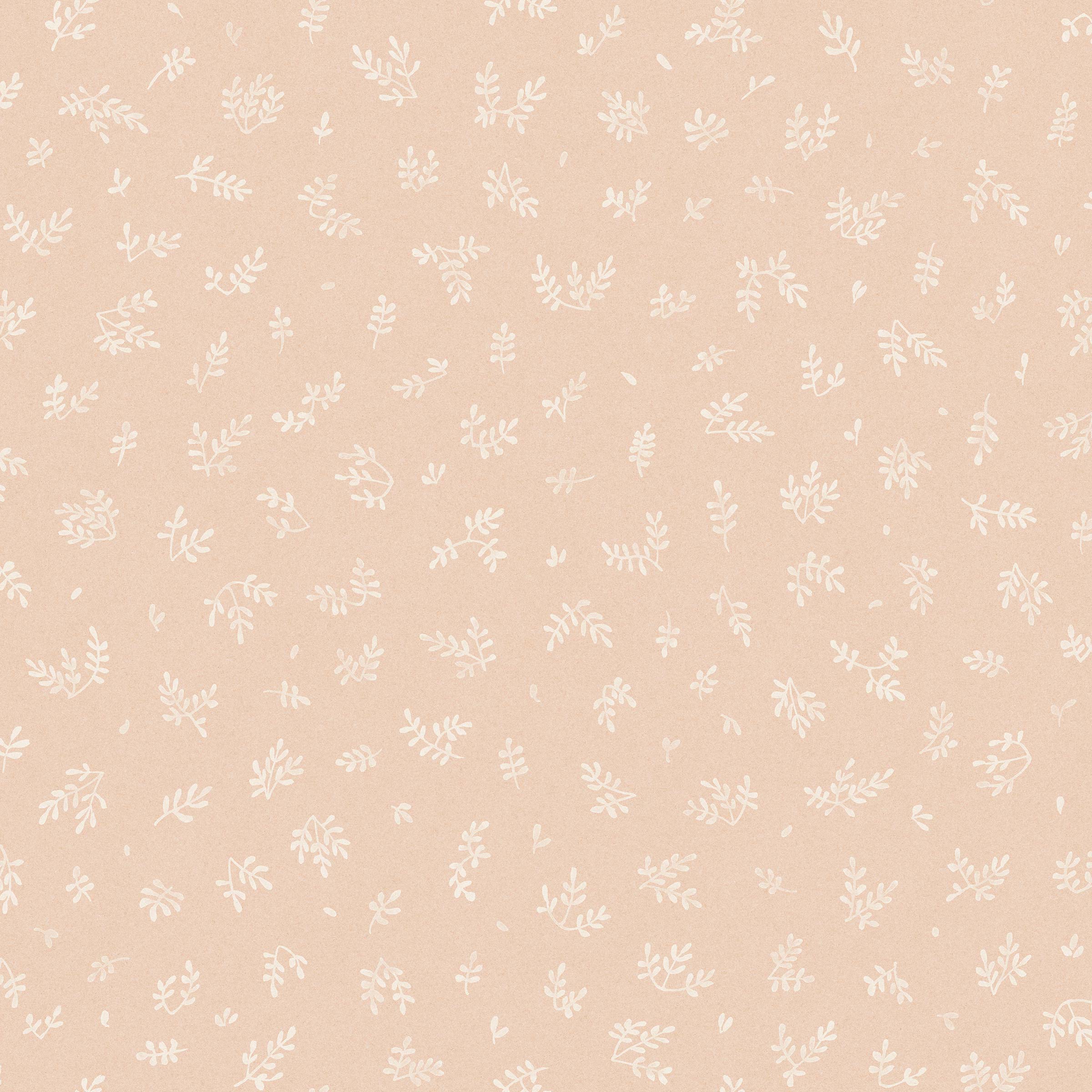 Detail of wallpaper in a minimal repeating leaf print in cream on a light pink field.