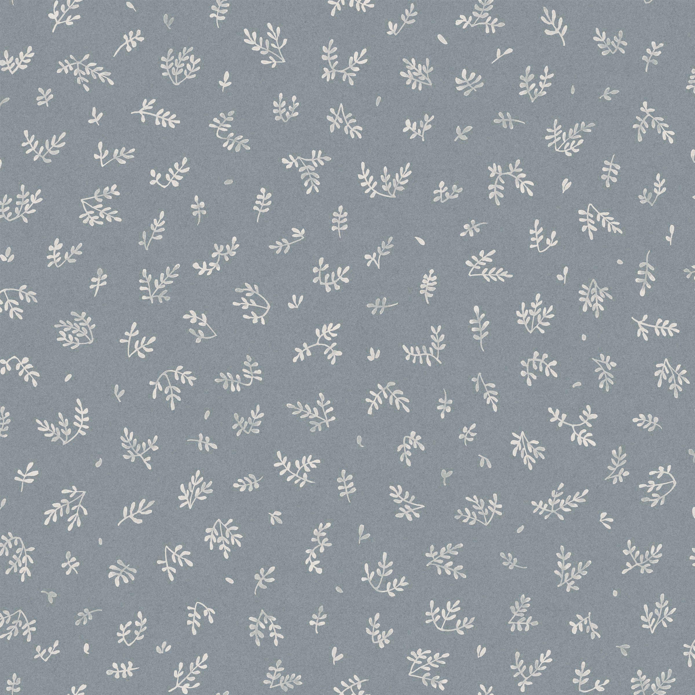 Detail of fabric in a minimal repeating leaf print in cream on a blue-gray field.