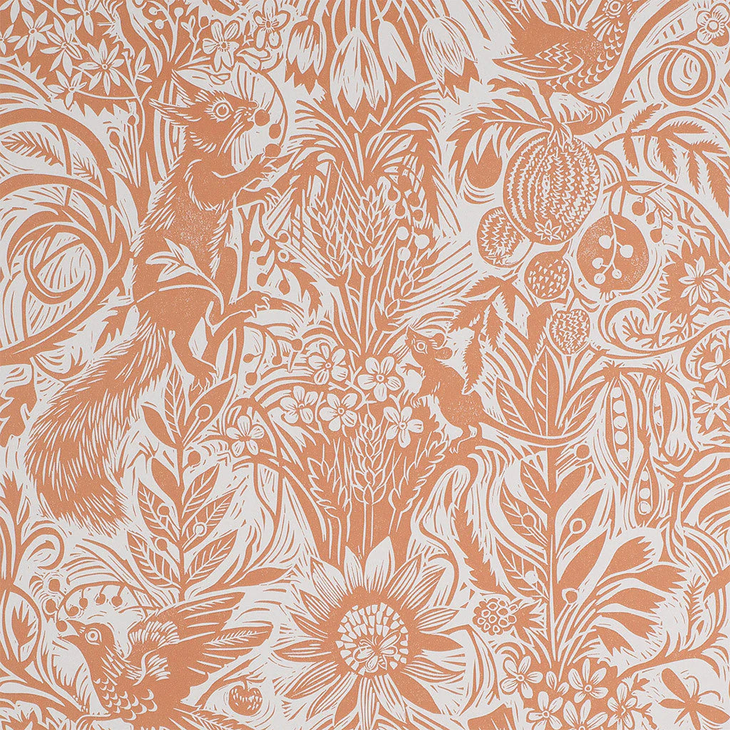 Detail of wallpaper in a playful squirrel and sunflower print in coral on a white field.