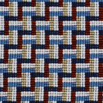 Detail of a woven stair step pattern in navy blue, white, red and gold.