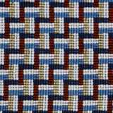 Detail of a woven stair step pattern in navy blue, white, red and gold.