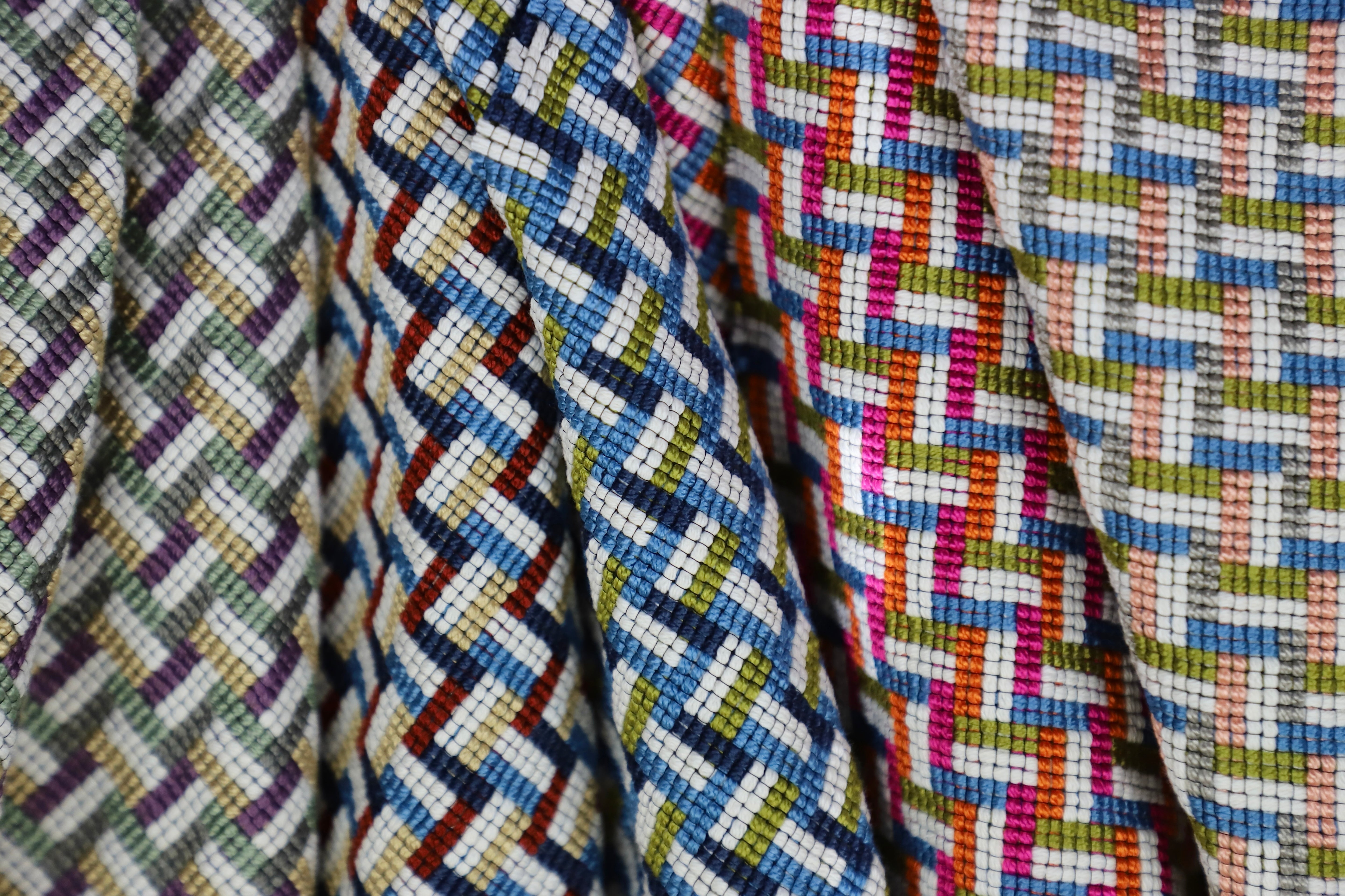 An array of woven stair step patterned fabrics.