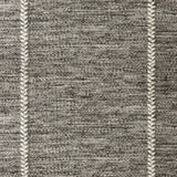 Broadloom carpet swatch in a stripe pattern in a light grey design