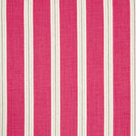 Detail of fabric in a repeating stripe print in white and gray on a pink field.