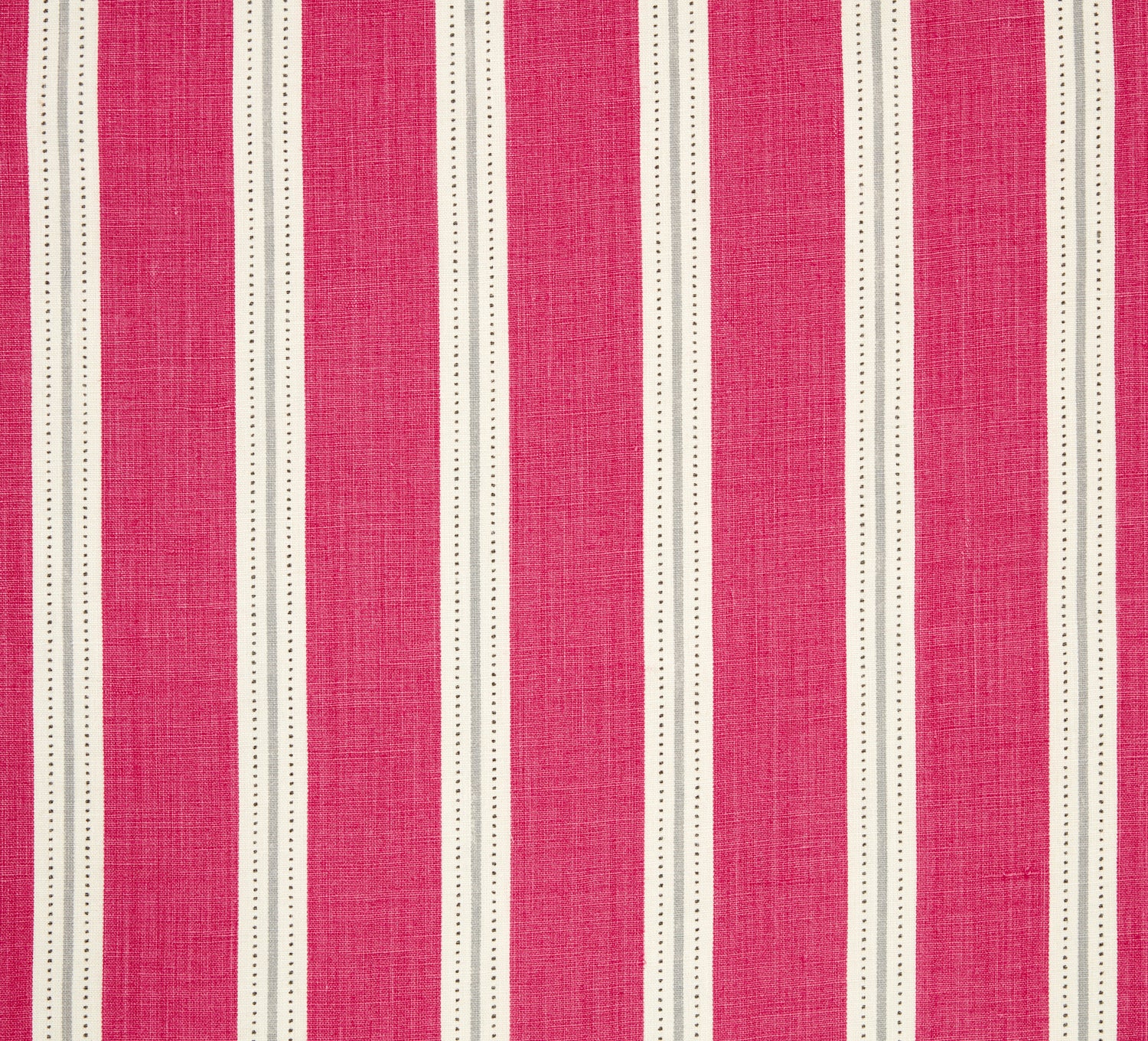 Detail of fabric in a repeating stripe print in white and gray on a pink field.